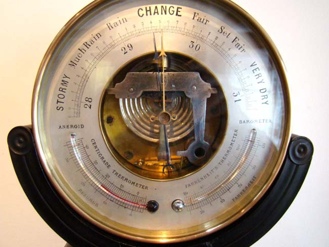 A fine 19th century Aneroid Barometer on a custom made black lacquered stand with gilt ormolu feet circa 1850. — image 2